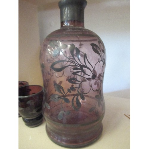 128 - ITALIAN[FLORENCE] GLASS CARAFE WITH 4 SHOT GLASSES,  ETCHED PLUM COLOURED PATTERNED GLASS.