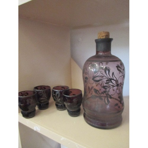 128 - ITALIAN[FLORENCE] GLASS CARAFE WITH 4 SHOT GLASSES,  ETCHED PLUM COLOURED PATTERNED GLASS.