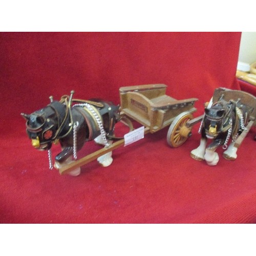 131 - A PAIR OF SHIRE/HEAVY HORSE ORNAMENTS, WITH HAND-MADE WOODEN CARTS.