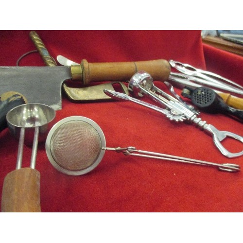 141 - BOX OF VINTAGE KITCHEN UTENSILS, KNIVES, CHOPPERS ETC. INCLUDES A BRASS GOLF CLUB BOTTLE OPENER.