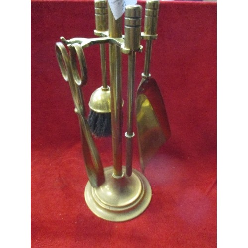 241 - VINTAGE BRASS COMPANION SET. SMALL AND ON STAND.