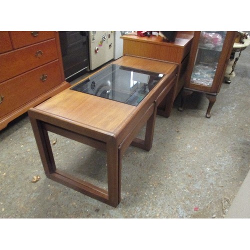 338 - 1970'S RETRO NEST OF TEAK AND GLASS TABLES BY SUNELM