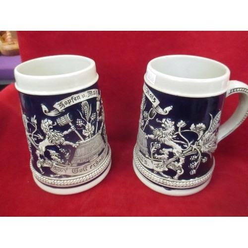 318 - 4 X GERMAN STEINS AND A VICTORIAN STONEWARE JUG WITH RAISED DESIGN OF ELEPHANT AND CAMEL