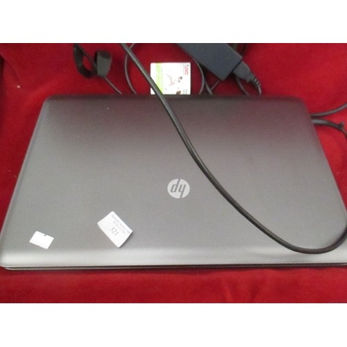 321 - HP LAPTOP - STARTS UP - APPEARS GOOD COND BUT MISSING A KEY COVER BELOW THE TOUCHPAD