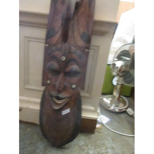 361 - LARGE AFRICAN CARVED WALL MASK INLAID WITH COWRIE SHELLS - 75CM