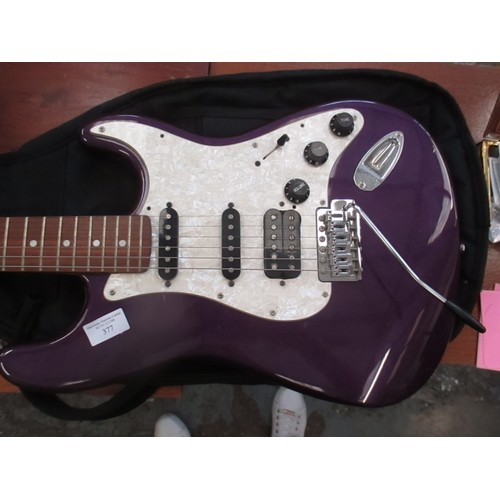 377 - ELECTRIC GUITAR BY SQUIER IN PURPLE AND WHITE WITH CARRY CASE