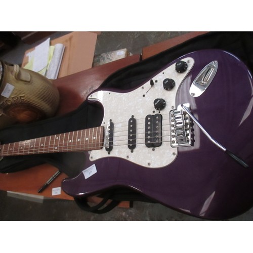 377 - ELECTRIC GUITAR BY SQUIER IN PURPLE AND WHITE WITH CARRY CASE