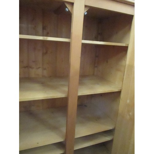 528 - LARGE SOLID PINE FARMHOUSE / HOUSEKEEPERS TYPE STORAGE CUPBOARD WITH PANELLED DOORS AND DRAWER BELOW... 