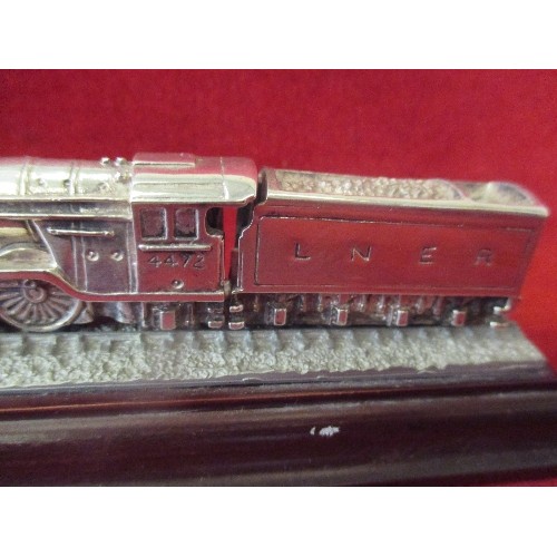 27 - HEAVY SILVER PLATED STEAM LOCOMOTIVE, LNER ON WOODEN BASE - BY LEGENDS OF STEAM - 14CM