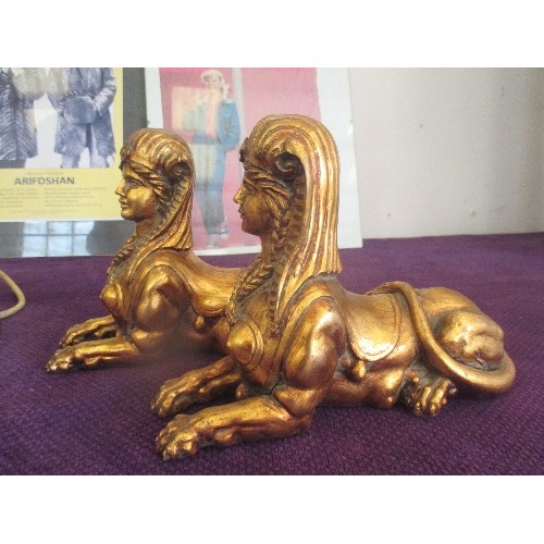 113 - A PAIR OF GILT SPHINX  FIGURES.