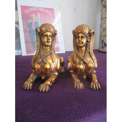 113 - A PAIR OF GILT SPHINX  FIGURES.