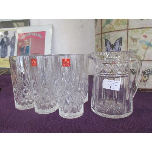 112 - HEAVY CRYSTAL WATER JUG AND SET OF HI-BALL TUMBLERS.