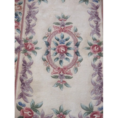 196 - LOVELY RECTANGULAR WOOL RUG, CREAM BACKGROUND WITH FLORAL BORDER ETC.