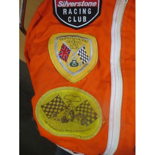 199 - BRITISH MOTOR RACING CLUB, FLAME RETARDANT FLAG MARSHALL SUIT. COMPLETE WITH MANY CLOTH BADGES.