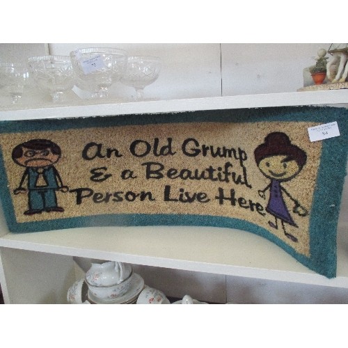 84 - HUMOROUS DOOR MAT. LOOKS UNUSED.