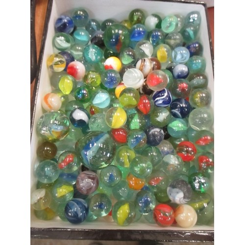 286 - TWO TUBS OF VINTAGE GLASS MARBLES