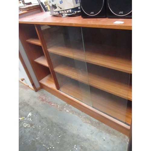 312 - TEAK BOOKCASE WITH GLASS SLIDING DOORS AND SHELVES - 105CM X 30CM X 77CM