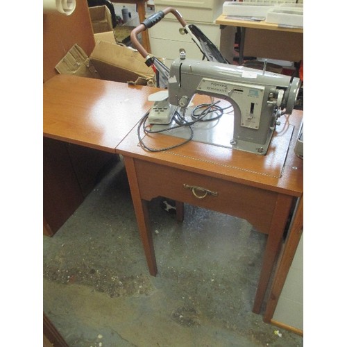 306 - A FRISTER & ROSSMANN ELECTRIC SEWING MACHINE - MODEL 35 - DROPS DOWN INTO A NEAT SIDE TABLE WITH FAU... 