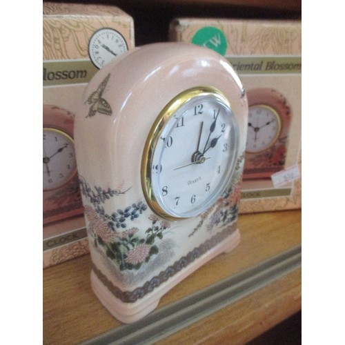 422 - TWO JAPANESE PORCELAIN CLOCKS 