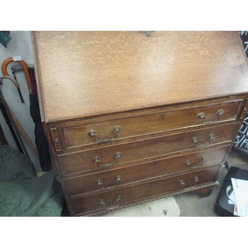 485 - CIRCA 1920'S GEORGIAN STYLE OAK BUREAU WITH 4 DRAWERS, THE FALL FRONT ENCLOSING PIGEON HOLES AND DRA... 