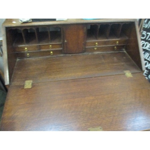 485 - CIRCA 1920'S GEORGIAN STYLE OAK BUREAU WITH 4 DRAWERS, THE FALL FRONT ENCLOSING PIGEON HOLES AND DRA... 