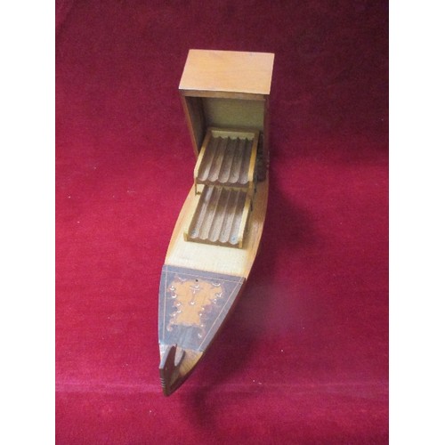 203 - A MID 20TH CENTURY ITALIAN SORRENTO WARE MUSICAL CIGARETTE BOX IN THE SHAPE OF A VENETIAN GONDOLA. T... 