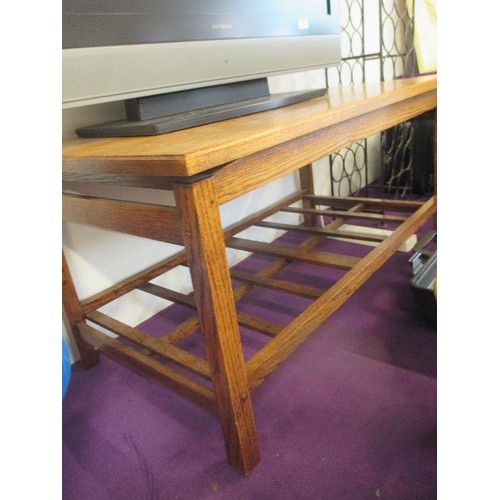 122 - HEAVY OAK COFFEE TABLE WITH LOWER SLATTED SHELF.