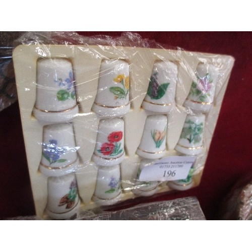 196 - COLLECTION OF CERAMIC THIMBLES IN DISPLAY RACKS