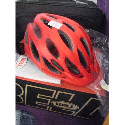 116 - BRAND NEW BELL TRACKER CYCLE HELMET. RED. BOXED AND PACKAGED TOGETHER WITH A SAMSONITE CASE