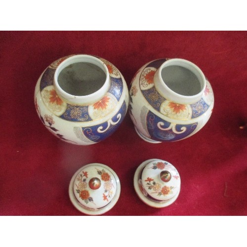 3 - PAIR OF PORCELAIN LIDDED JARS DECORATED IN IMARI COLOURS - 20CM  - ONE HAS REPAIR