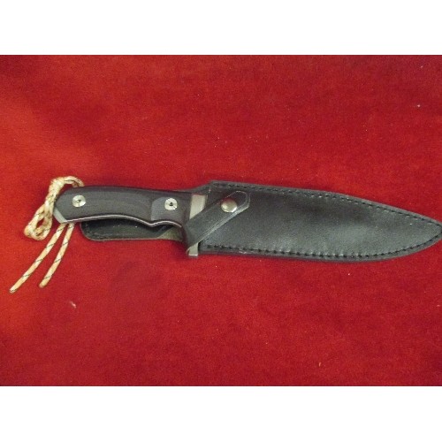 46 - HEAVY STEEL KNIFE WITH BLACK HANDLE AND LEATHER SHEATH - KNIFE IS 34CM