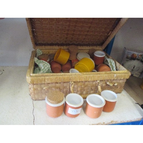 399 - WICKER BASKET FILLED WITH MINIATURE TERRACOTTA JARS AND OTHERS