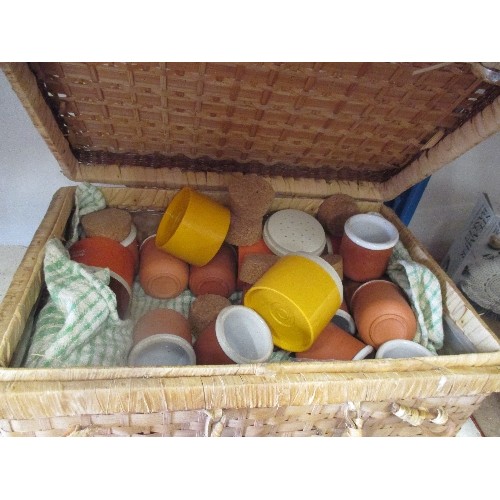 399 - WICKER BASKET FILLED WITH MINIATURE TERRACOTTA JARS AND OTHERS