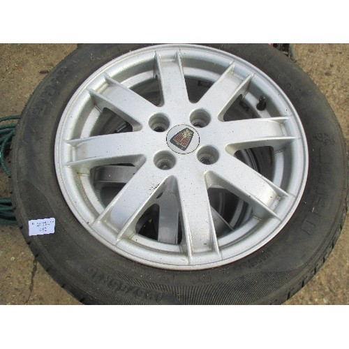 462 - 4 ROVER 195/155R15 WHEELS