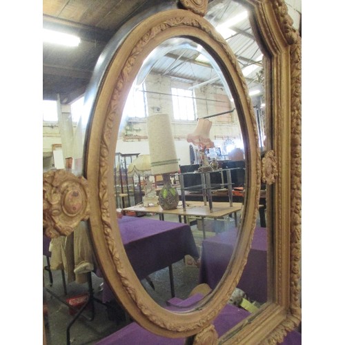 210 - A LARGE AND IMPRESSIVE EMPIRE STYLE GILT FRAMED WALL MIRROR - THE CARVED AND MOULDED FRAME WITH FRUI... 