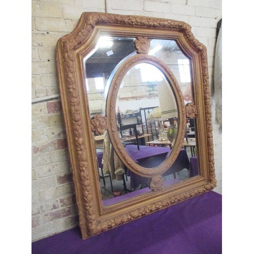 210 - A LARGE AND IMPRESSIVE EMPIRE STYLE GILT FRAMED WALL MIRROR - THE CARVED AND MOULDED FRAME WITH FRUI... 