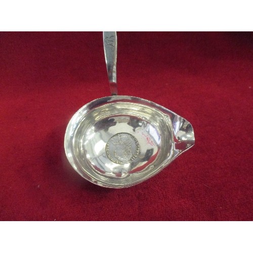 121 - A SILVER GEORGE III TODDY LADLE WITH SILVER 1 SHILLING PIECE IN THE BOWL - WHALE BONE HANDLE AND COL... 