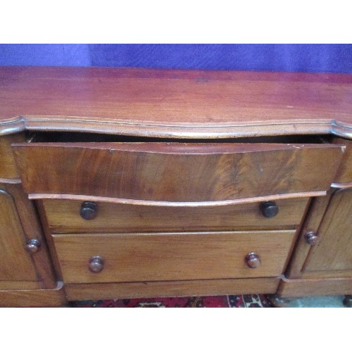 247 - A LARGE VICTORIAN MAHOGANY SIDEBOARD, THE TOP THREE DRAWERS WITH SERPENTINE DRAWER FRONTS OVER TWO F... 