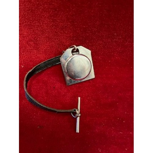 128A - FRENCH NURSES PENDANT WATCH WITH LEATHER STRAP AND T BAR,