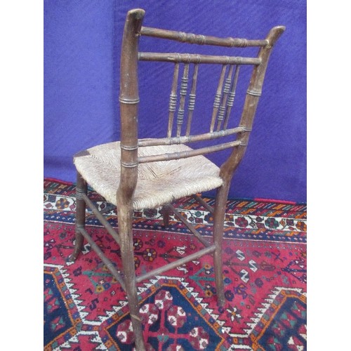 245 - A MID 19TH CENTURY FAUX BAMBOO SIDE CHAIR WITH RUSH SEAT