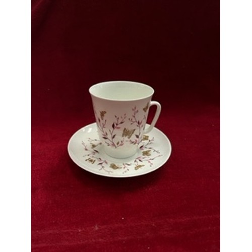 16 - A VERY ATTRACTIVE LOMONOSOV USSR, PORCELAIN CUP AND SAUCER DECORATED WITH PINK LEAVES AND GILT BUTTE... 