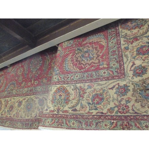 257A - A SUPERB AND VERY LARGE VINTAGE TABRIZ CARPET WITH RED GROUND AND FOLIATE PATTERNED FIELD, CREAM AND... 