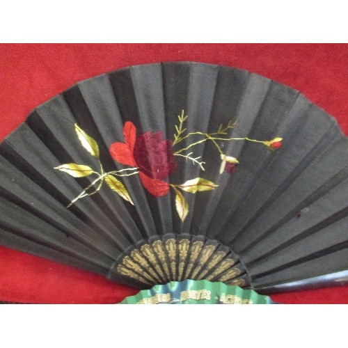 79B - A VICTORIAN BLACK SATIN MOURNING FAN EMBROIDERED WITH A ROSE - THE EBONY BLADES WITH GILT DESIGN - O... 