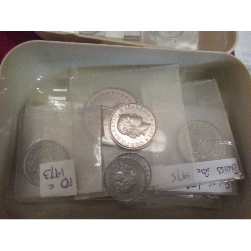 186C - TUB OF FOREIGN COINS INC AUSTRALIA, HONG KONG, AND A SMALL TUB OF SWISS COINS