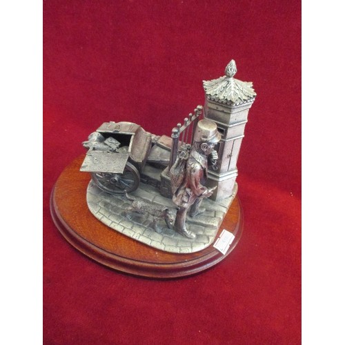 92 - 'POSTMAN 1885' FROM EVERGREEN STUDIO COLLECTION. HEAVY 'PEWTER' ORNAMENT ON WOODEN BASE.