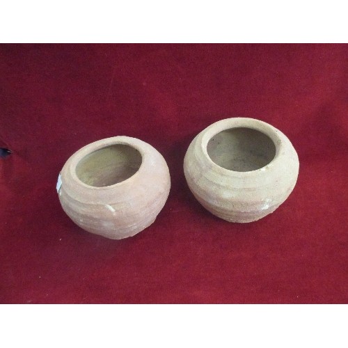 97 - A PAIR OF RUSTIC TERRACOTTA POTS FROM EGYPT.