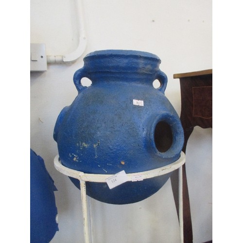 124 - RUSTIC BLUE CLAY POT WITH HANDLES. ROUND BOTTOMED, SITS ON WHITE METAL STAND.