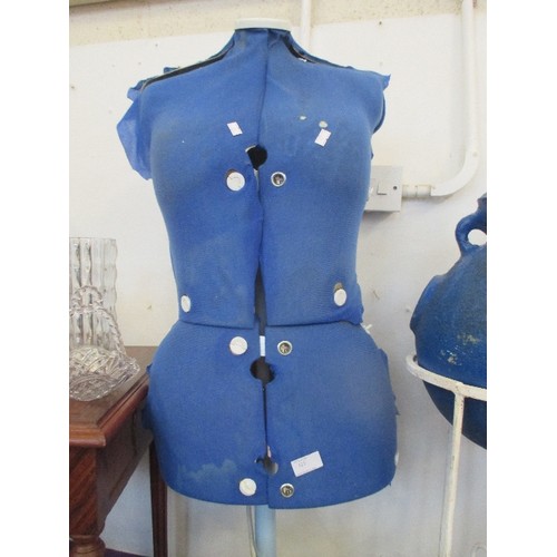 125 - DRESSMAKERS MANNEQUIN. IN BLUE FABRIC, ADJUSTABLE AND ON STAND.