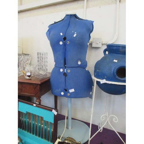125 - DRESSMAKERS MANNEQUIN. IN BLUE FABRIC, ADJUSTABLE AND ON STAND.