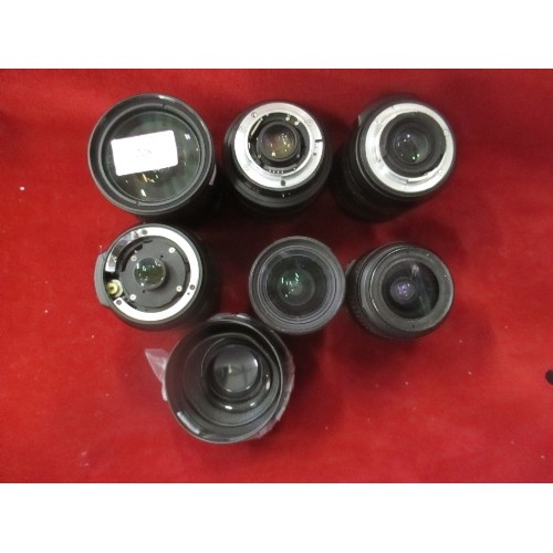 228 - 6 X NIKON CAMERA LENSES AND SOME HOODS. INCLUDES A DX NIKKOR 55-200, A DX SWM VR ED ASPHERICAL, AND ... 
